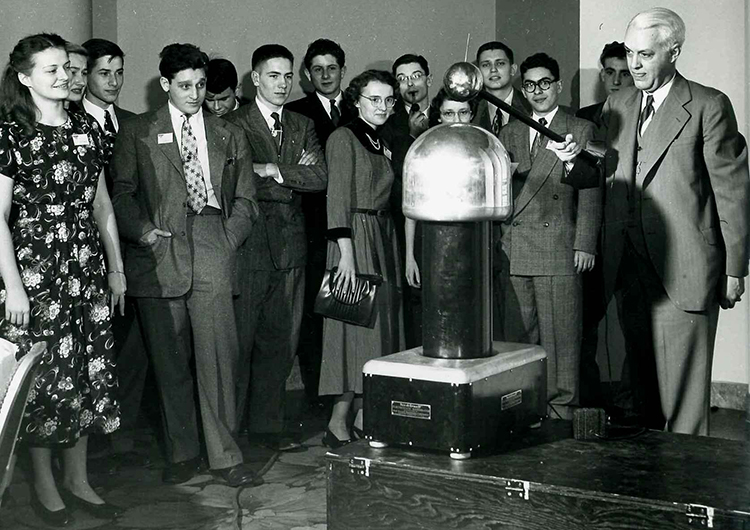 Dr. Richard Hitchcock of Westinghouse introduced 'junior,' the portable Van de Graaff generator to STS 1949 finalists.