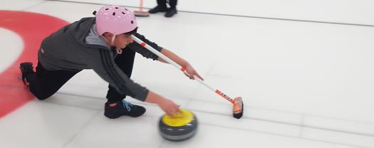 Dennis tried curling for the first time in Stockholm.