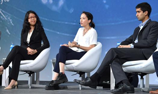 Ann Makosinski (middle) invented a flashlight powered by the touch of your hand.