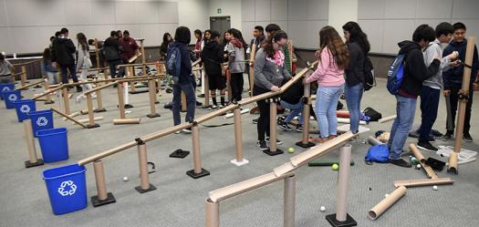 Students from local schools are bussed to the convention center for a unique STEM experience at Education Outreach Day. At Intel ISEF 2017, students built the ultimate recycling machine.