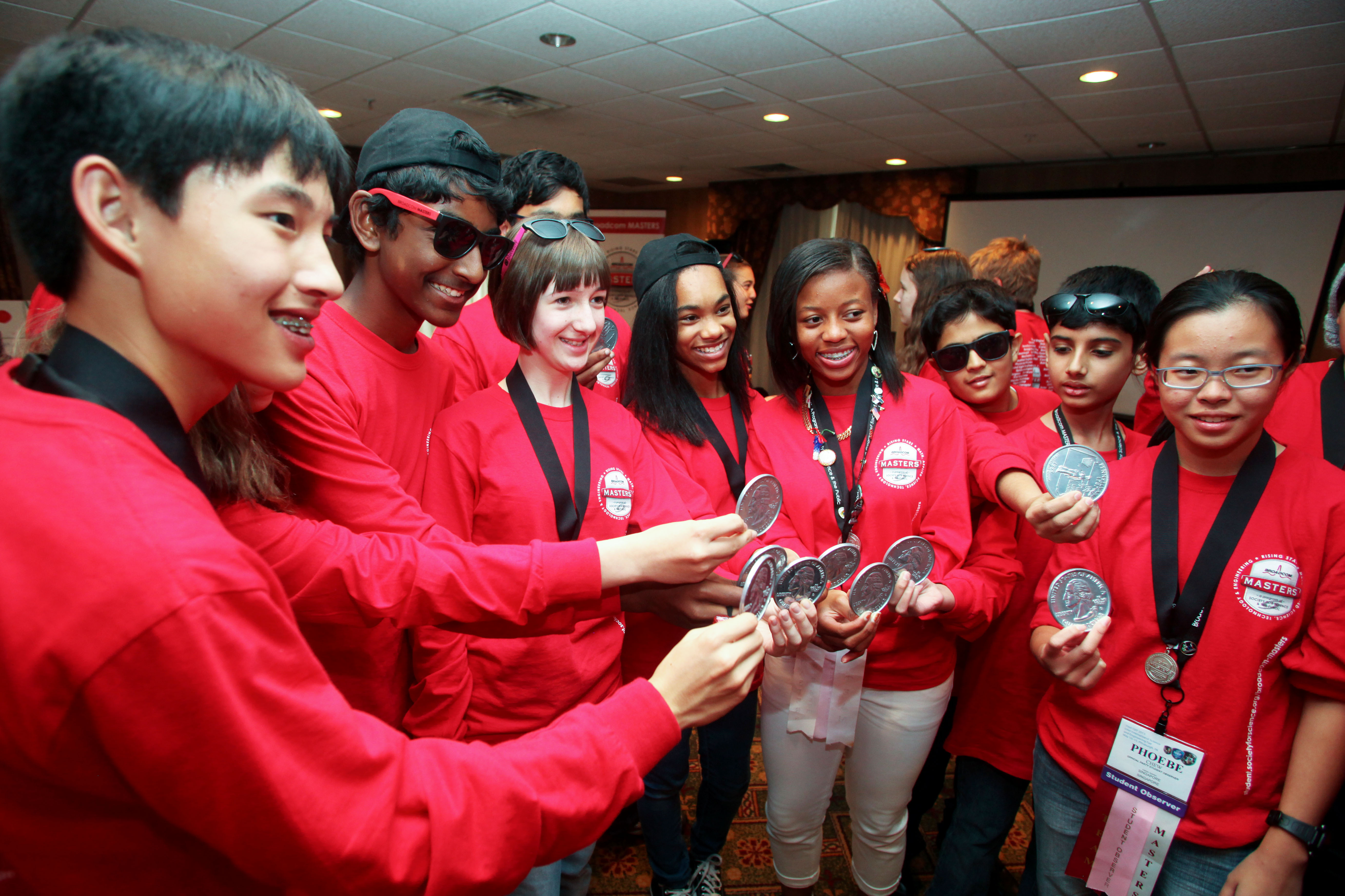 Delegates show off their medals at the 2015 Broadcom MASTERS International.