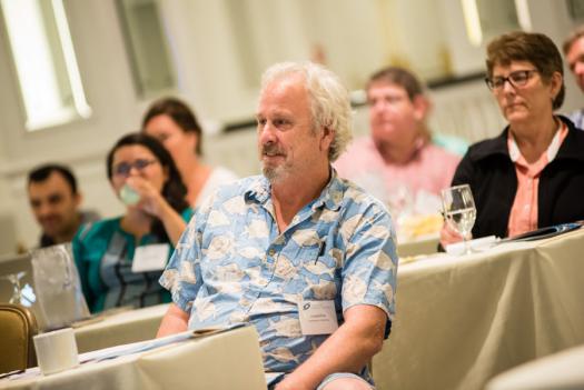 Charlie Flint listens to a speaker at the Advocate Training Institute. 