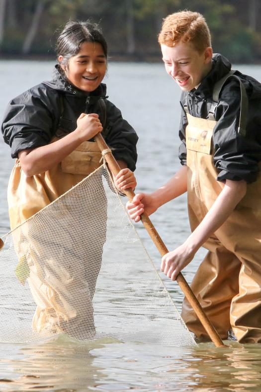Ananya Ganesh and Brendan Crotty waded into the Chesapeake Bay to caught wildlife in large nets, called seining.
