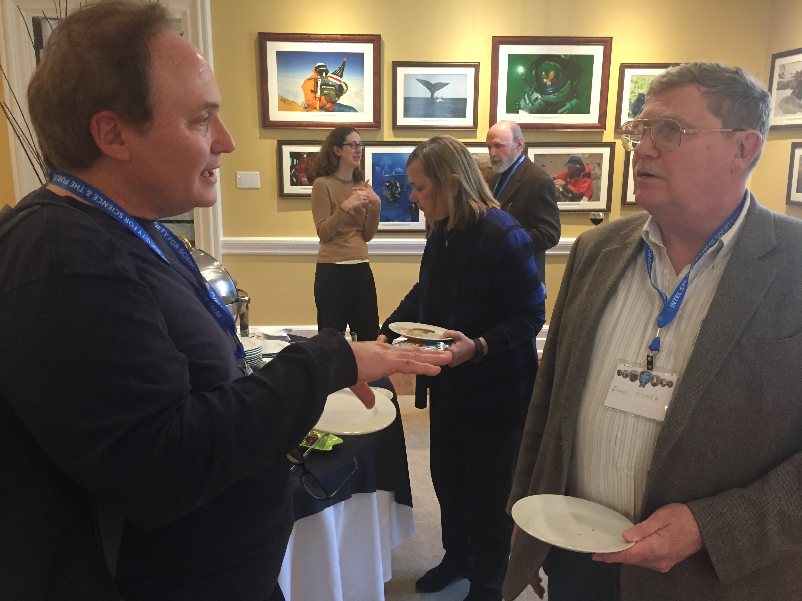 Gary Pisner (STS 1971) chats with a friend and fellow engineer and lawyer, Daniel FIsher.