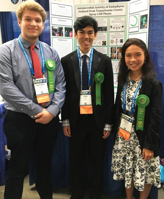 Matthew, John, and Nicole showcasing their research at Intel ISEF 2018.