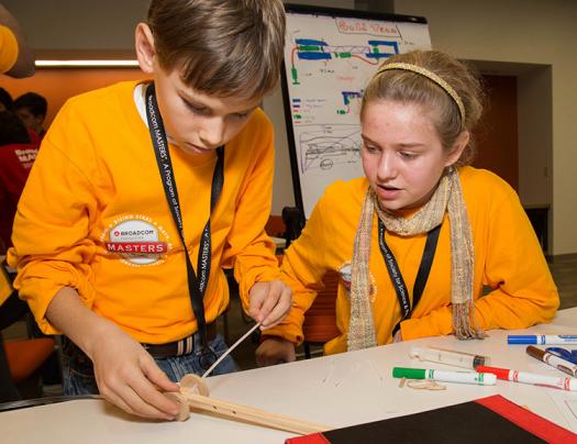 James Fagan and Eleanor Sigrest work on their robotic crab arm design.