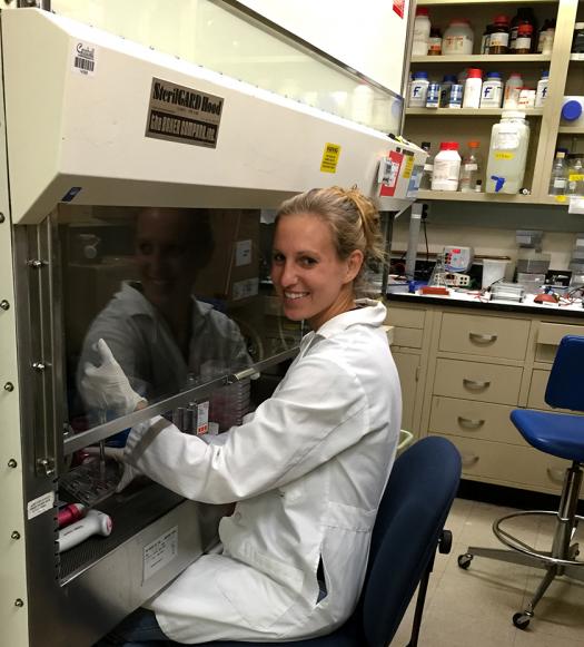 Maria working in the lab for her Ph.D.