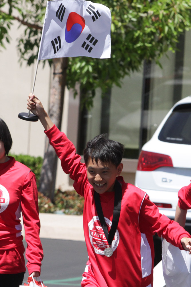 Junmo Lee of South Korea waving his flag.