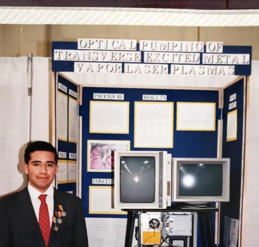 John Taboada Jr. in front of his project board at Intel ISEF 1990