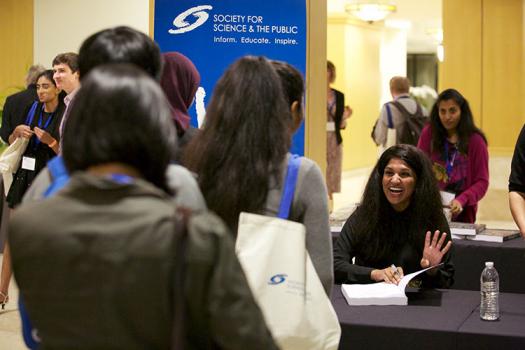 Society alumna Nina Vasan signed copies of her new book, Do Good Well.