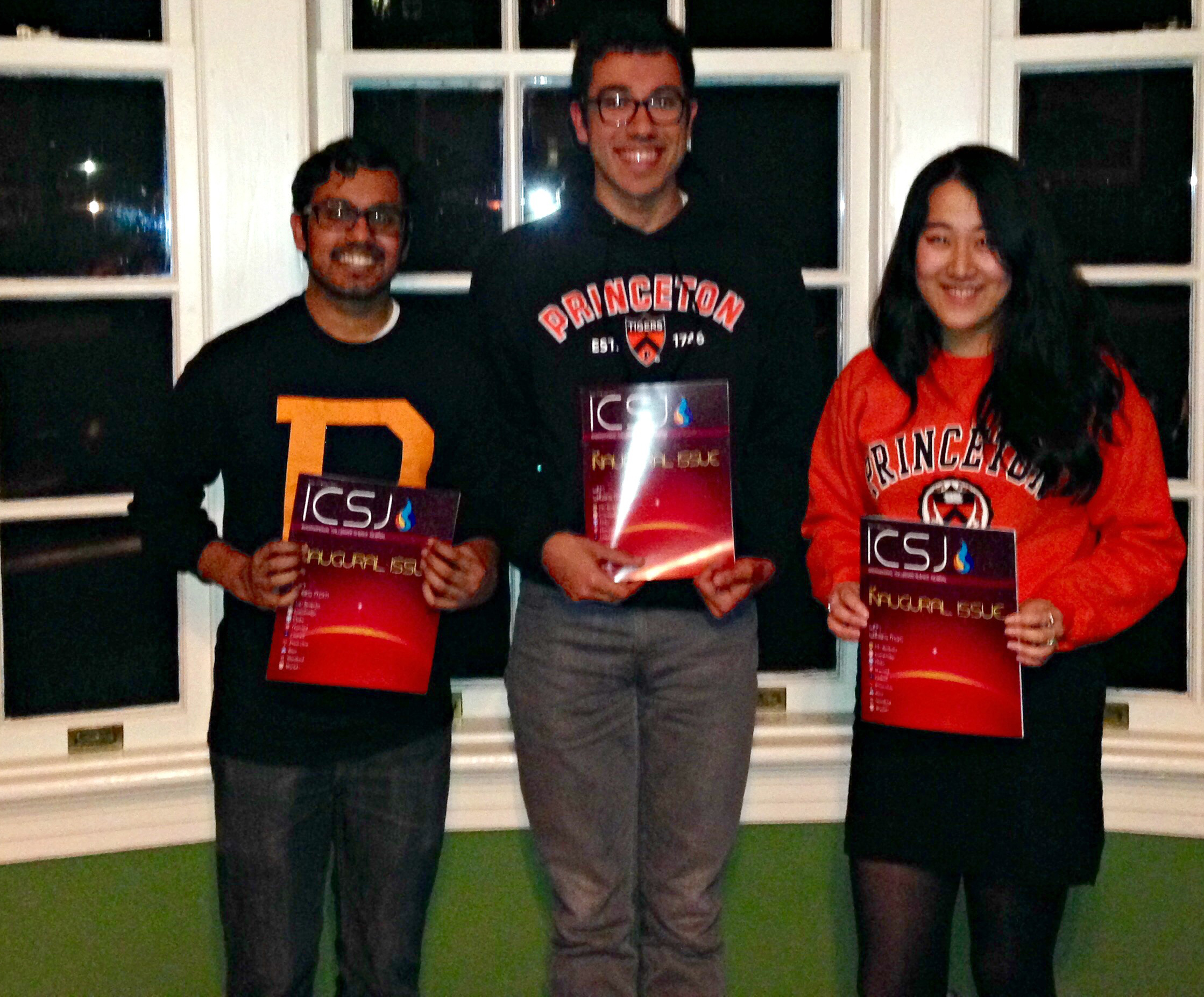 Abrar Choudhury, Stephen Cognetta, and Cissy Chen with their copies of ICSJ at Princeton University