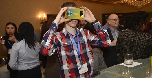 Aaron Yeiser tests a Regeneron virtual reality headset.