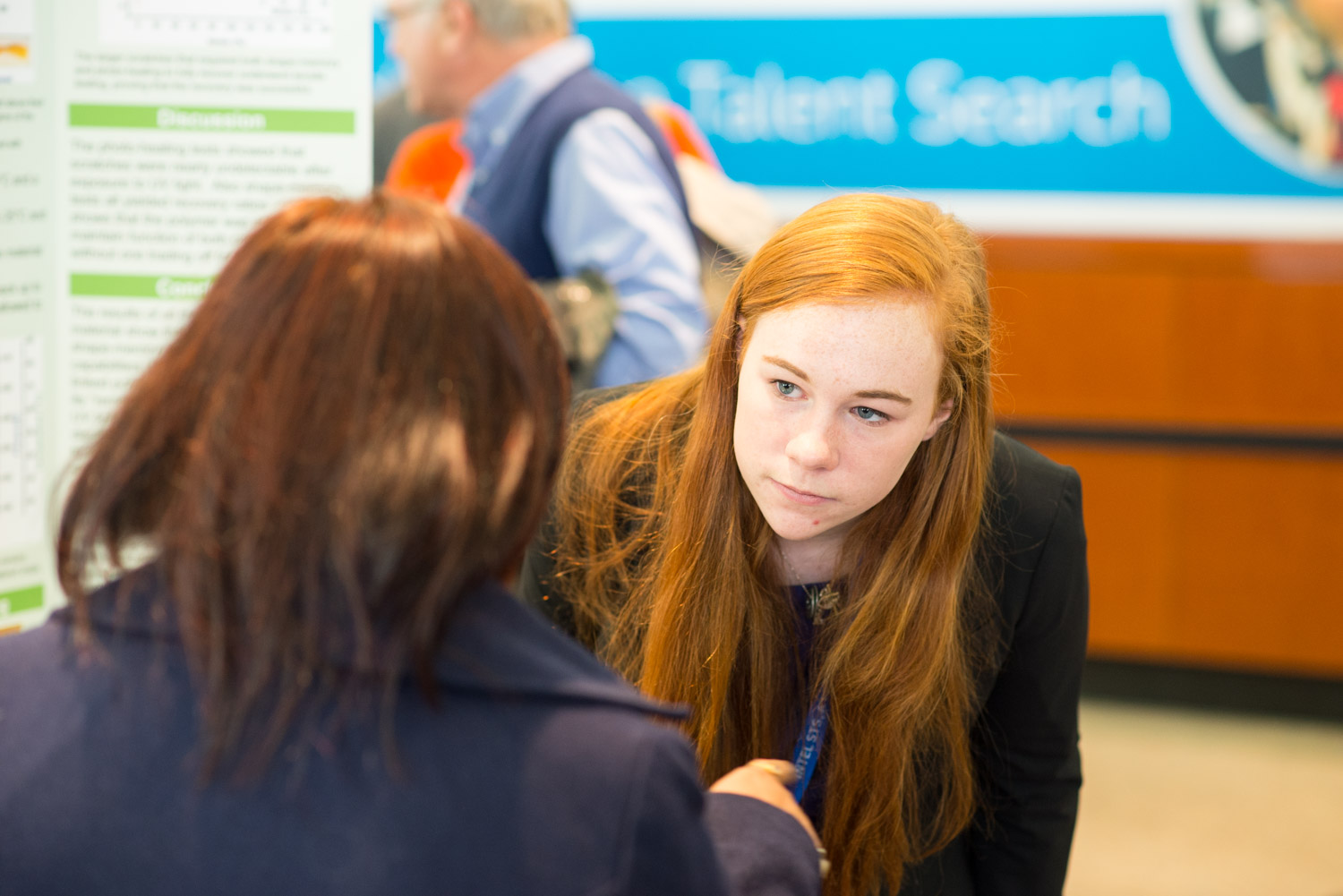 Emily Spencer from Moreland Hills, Ohio answering questions about her research on materials science.