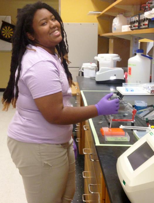 SOAR mentee Nzinga Hendricks hard at work in an Emory lab.