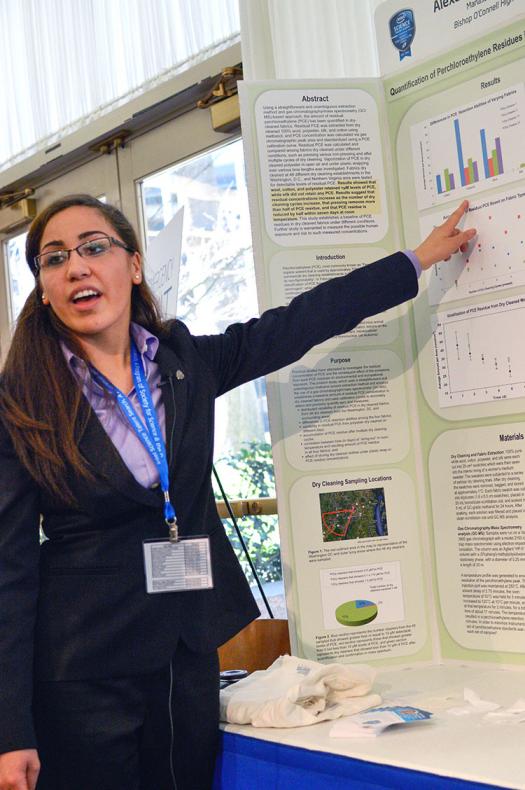 Alexa Dantzler presents her research at Intel STS 2013. Photo courtesy of the Society.