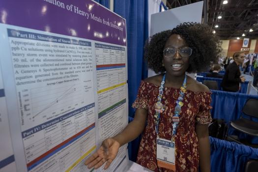 Amara explains the results of her research at the Public Exhibition of Projects at ISEF 2019