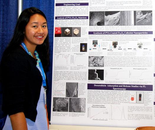 Margaret stands with her Intel ISEF project. Photo courtesy of Margaret Cirino.