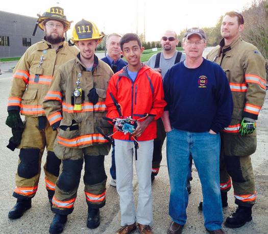 Mihir tested his drone with local firemen to see how it worked in a real-world scenario. Photo courtesy of Mihir Garimella.