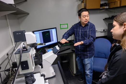 An NIH researcher explains his equipment