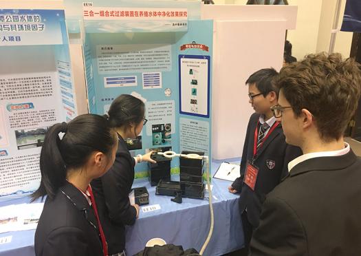 Tassilo viewed projects by Chinese high school students during his trip to China.