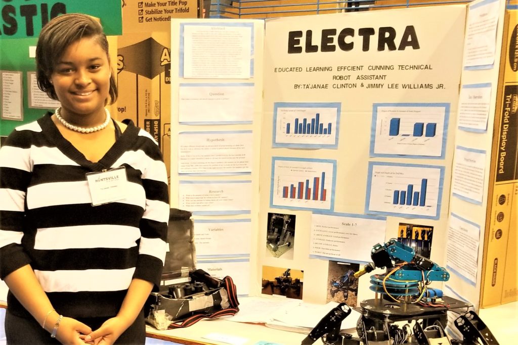 Ta’Janae and ELECTRA posing at the Alabama Science and Engineering Fair.