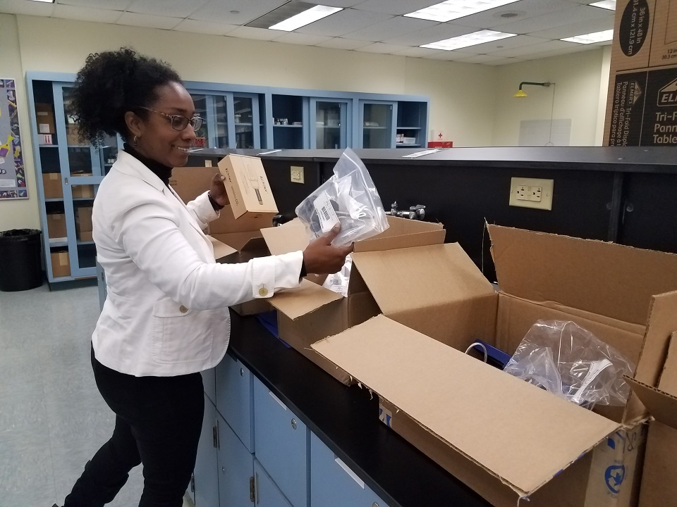 STEM Research Grant teacher unboxing equipment