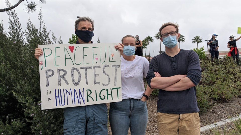 Alina Pollner, her brother Tristan and father Reinhold, attend a local Black Lives Matter protest in San Diego, CA.