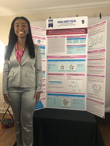 Maria Fields and her project, "Genes that Potentially Drive Health Outcome Disparities for African-American Women with TNBC."