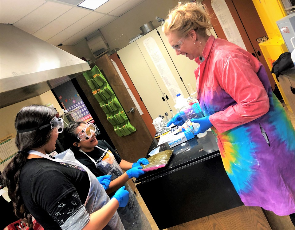 Advocate Debbie Morgan and her students in a lab.