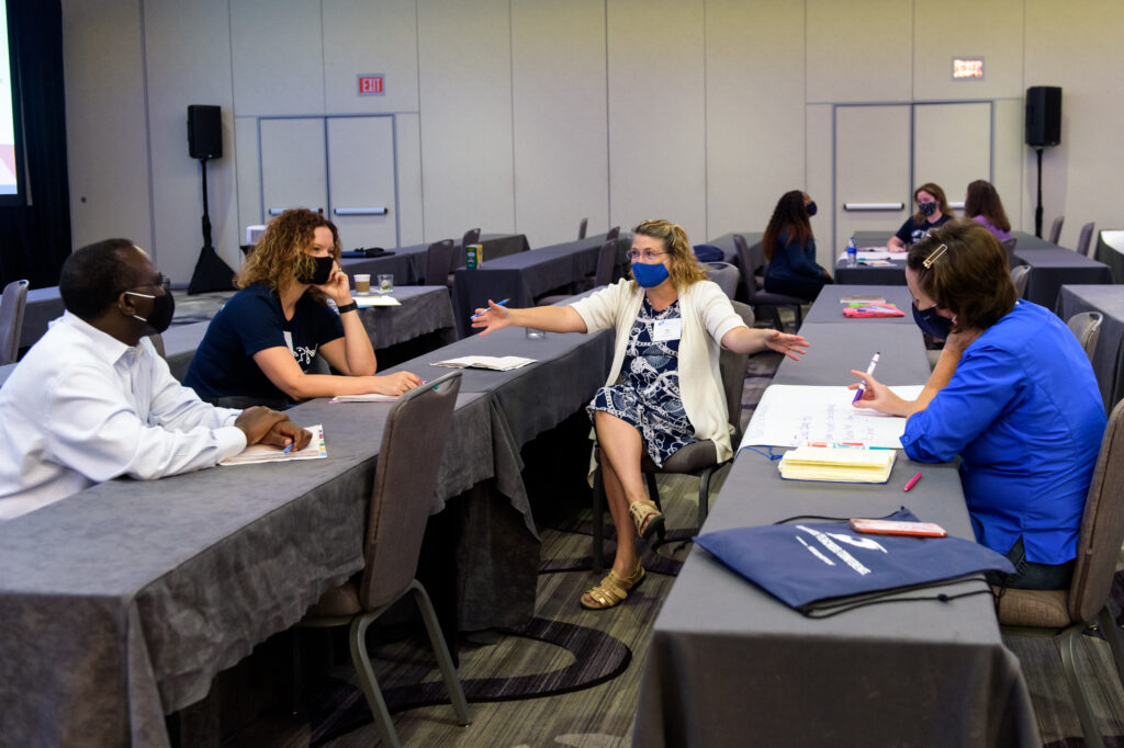 Teachers collaborate during the hybrid 2021 High School Research Teachers Conference