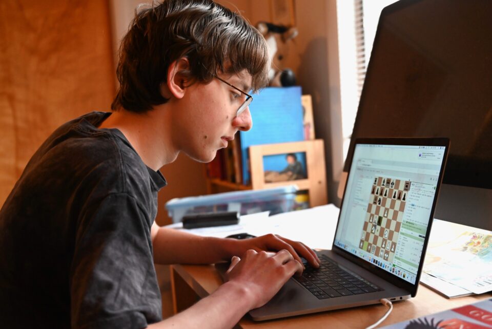 Daniel Larsen, a Regeneron Science Talent Search 2022 Finalist plays an online game of chess.