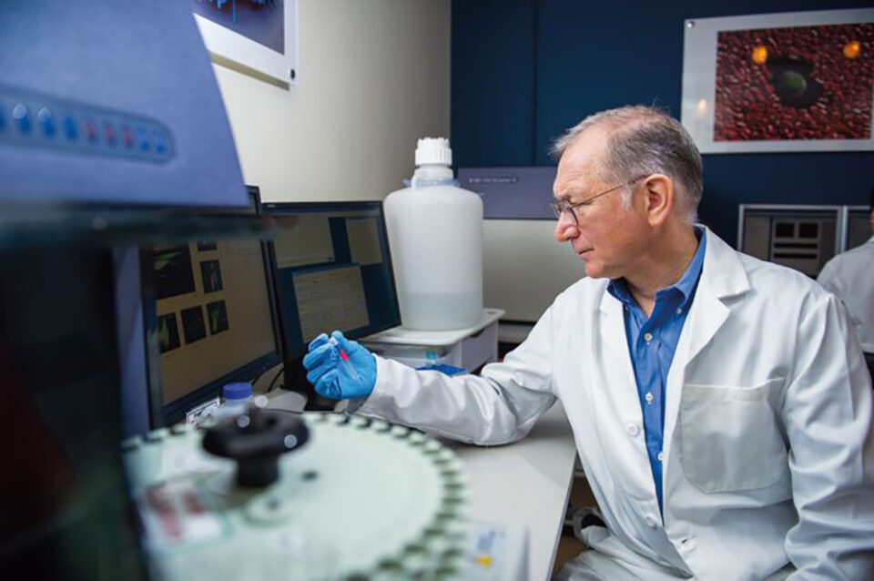 Notable Alumni - Gordon Freeman in his lab at the Dana-Farber Cancer Institute.