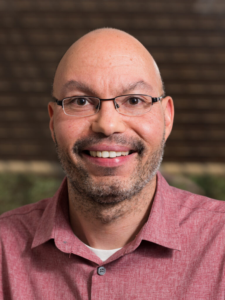Headshot of Bart Bartlett, professor and researcher at the University of Michigan.