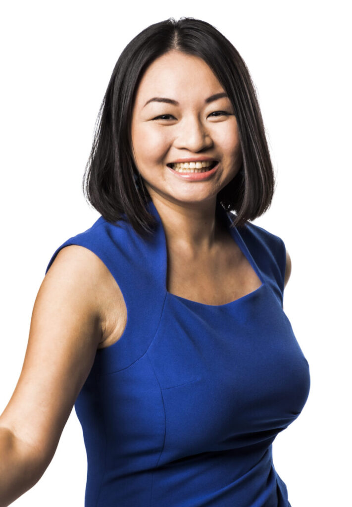 Bonnie Lei, an alumni of STS 2011 and ISEF 2011, poses in front of a white backdrop, smiling.