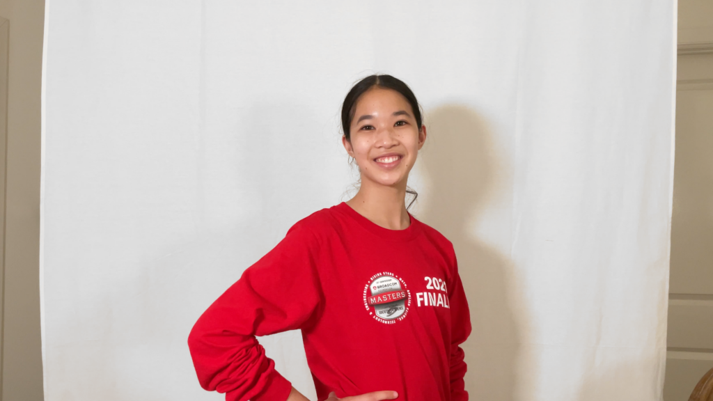 Hailey Van is a Broadcom MASTERS 2021 alumni posing in front of a white back drop.