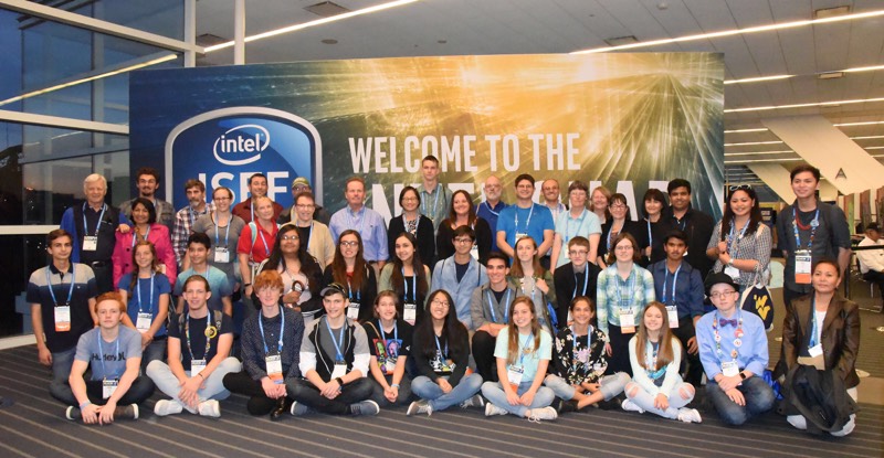 ISEF finalists from New Mexico posed in front of an ISEF banner