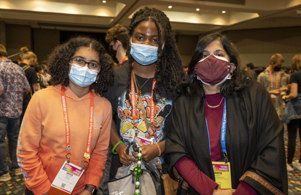 Society for Science President & CEO and Publisher of Science News poses for a photo with finalists during the 2022 Regeneron ISEF pin exchange