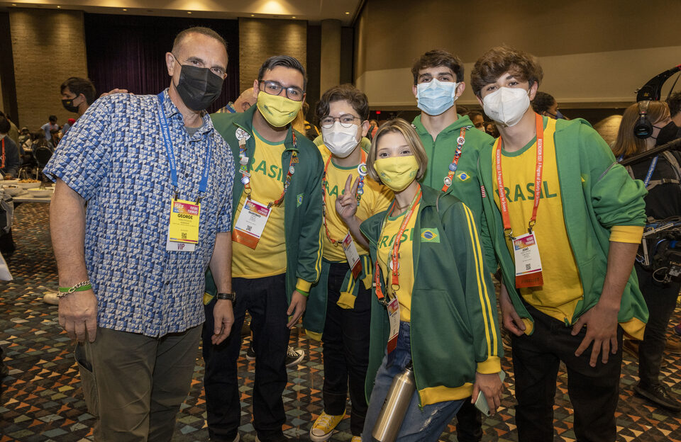 George Yancopoulos and Finalists from Brazil pose for a photo at the pin exchange