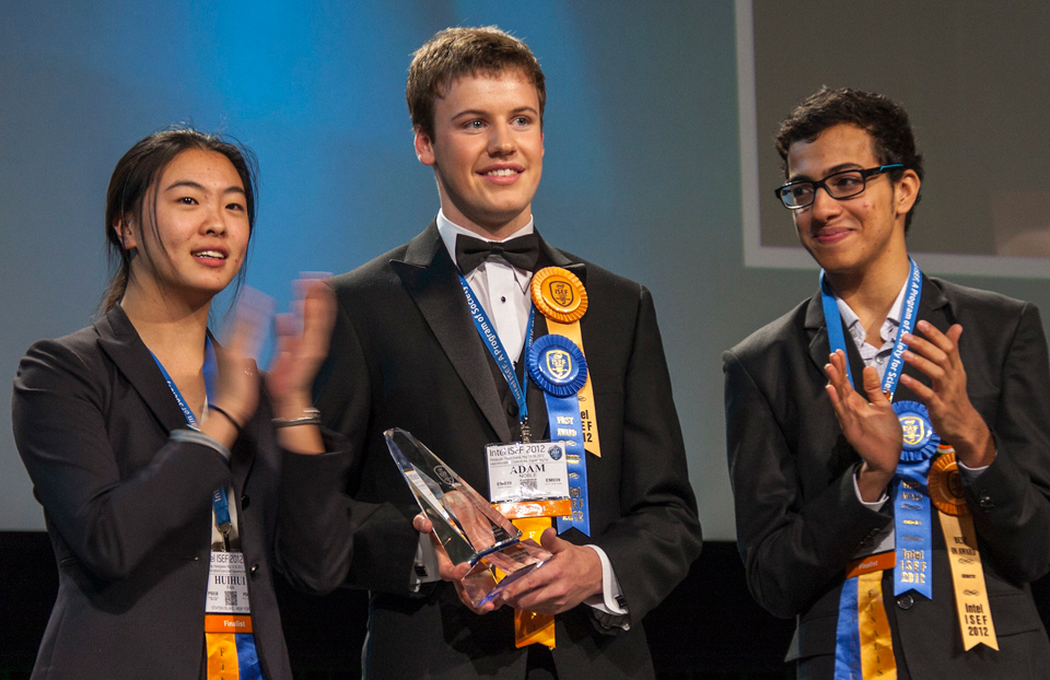 2012 ISEF Dudley R. Herschbach SIYSS Award winners on stage: Huihui Fan, Adam Joel Noble, Raghavendra Ramachanderan