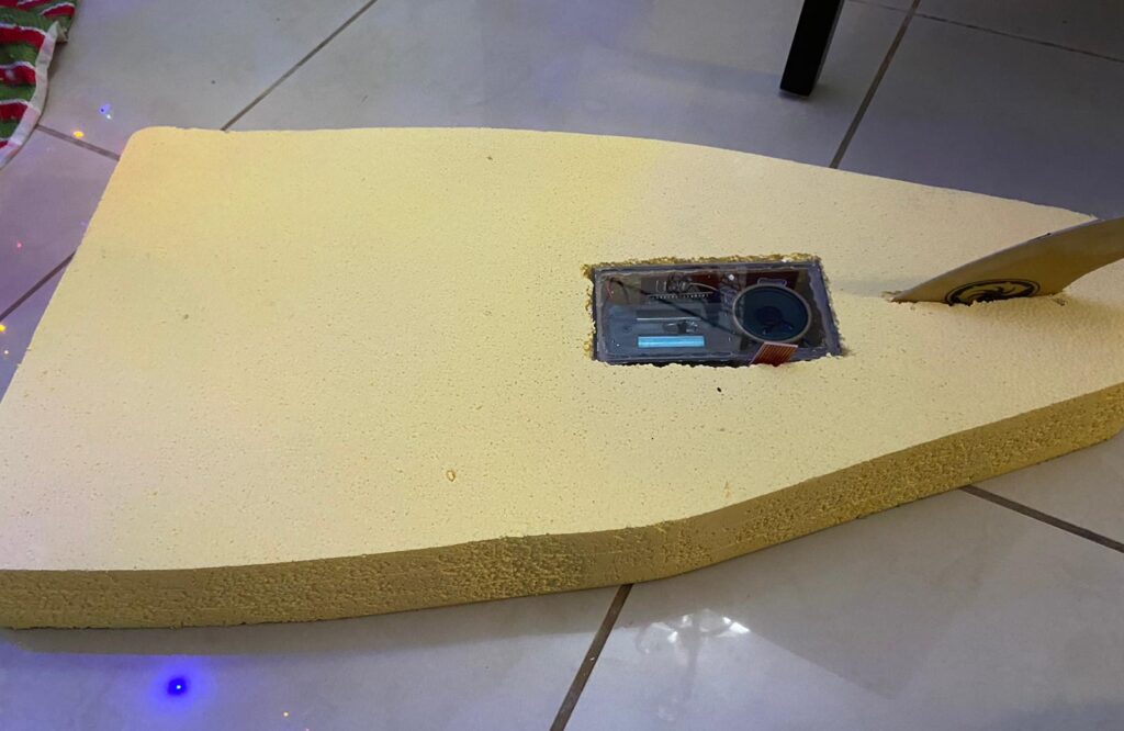 Dalismar Marrero's prototype of a shark repelling surfboard. The Arduino NANO is embedded into half of a foam surfboard.