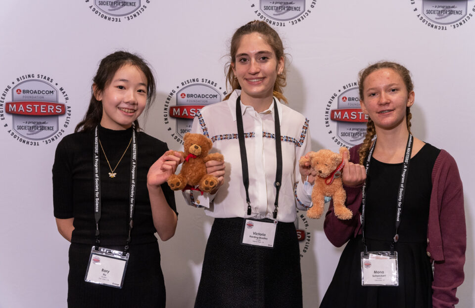2022 Broadcom MASTERS Finalists posed for photos with the Broadcom MASTERS bear at the photo booth during the project showcase.