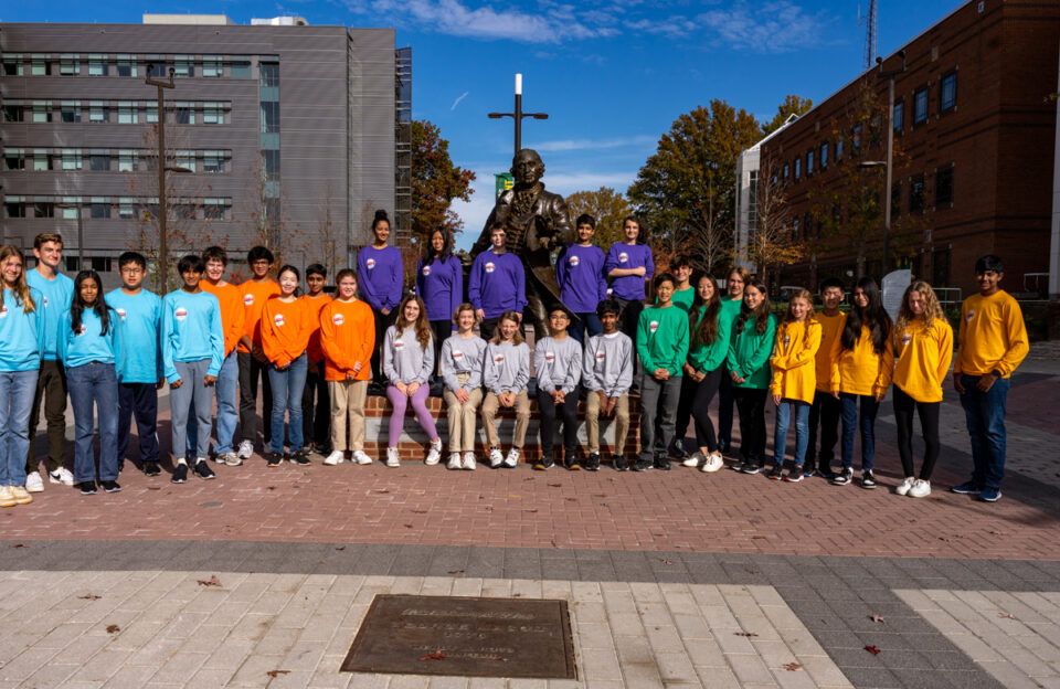 The 2022 top 30 Broadcom MASTERS finalists gathered for a picture on George Mason University's campus in between challenges.