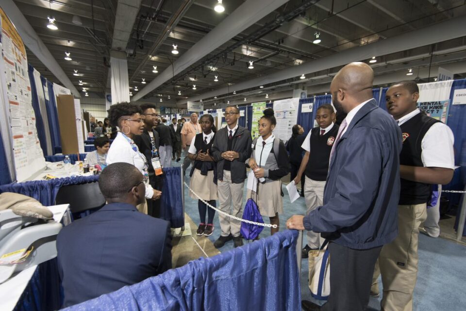 School students at ISEF 2018 visiting the project hall and finalists.