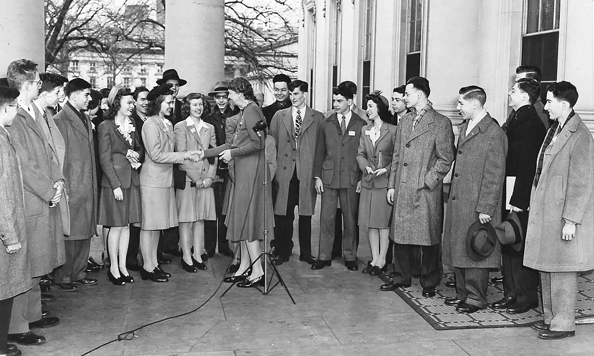 First Lady Eleanor Roosevelt shakes hands with finalists 
