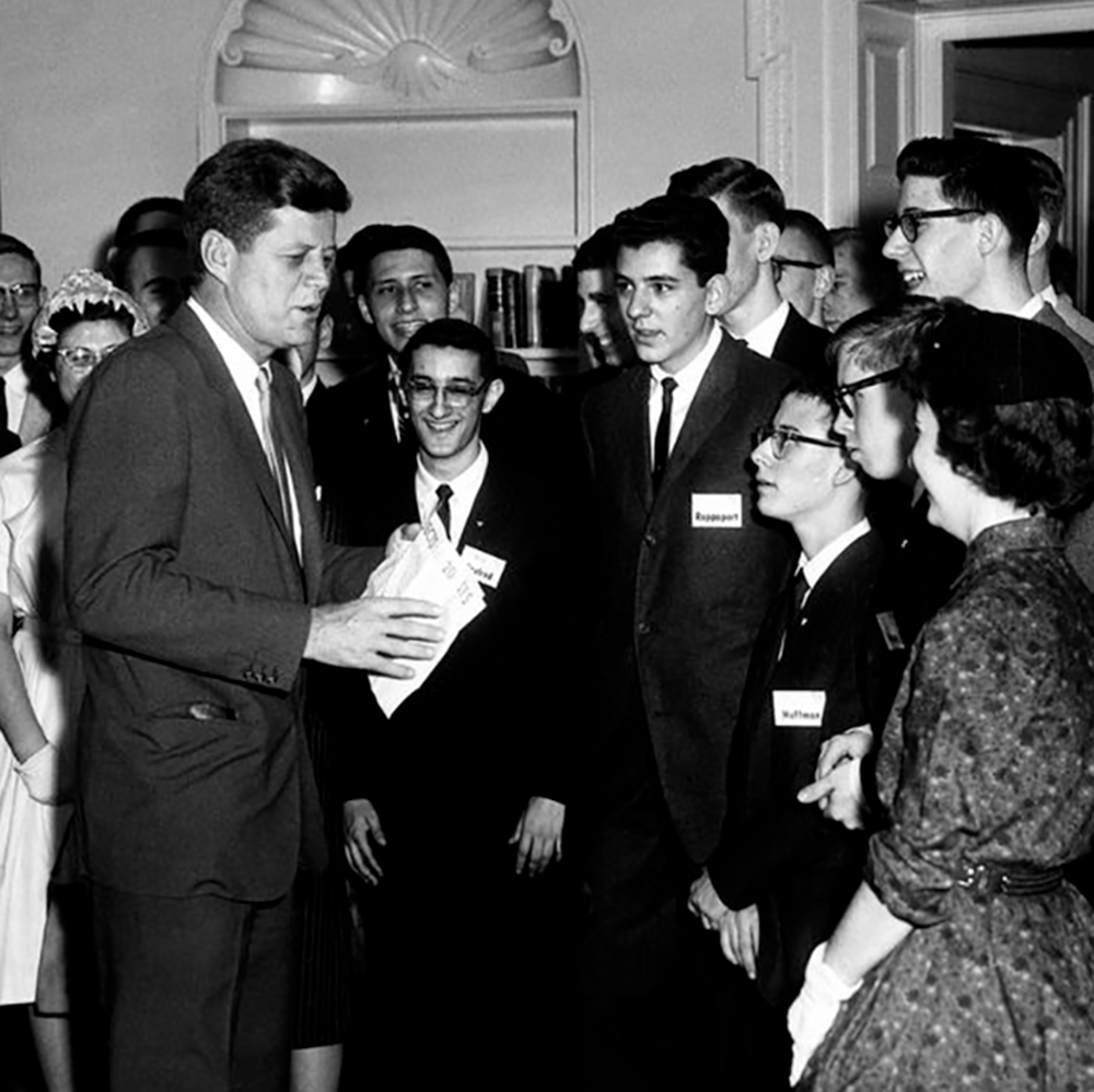 President Kennedy and Vice President Johnson speak with STS finalists at the White House