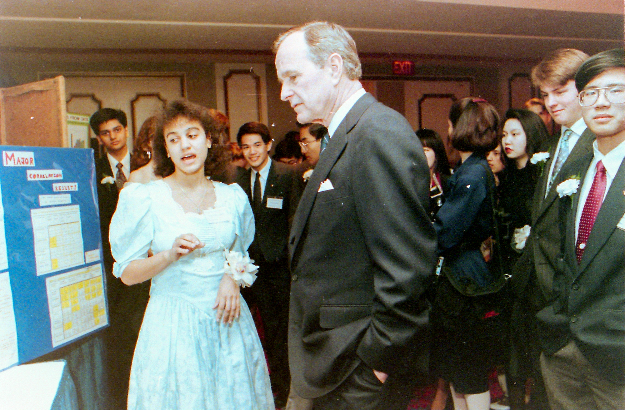 STS finalist Tara Bahna-James explains her research to President George H. W. Bush