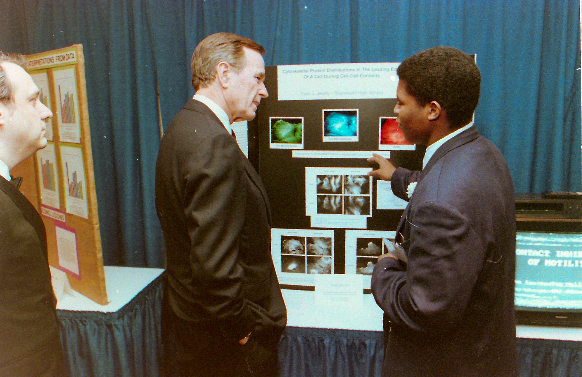 STS finalist Yves Jeanty discusses his research with President George H. W. Bush