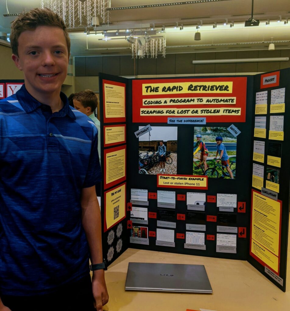 David Kent standing at his project board of the Rapid Retriever