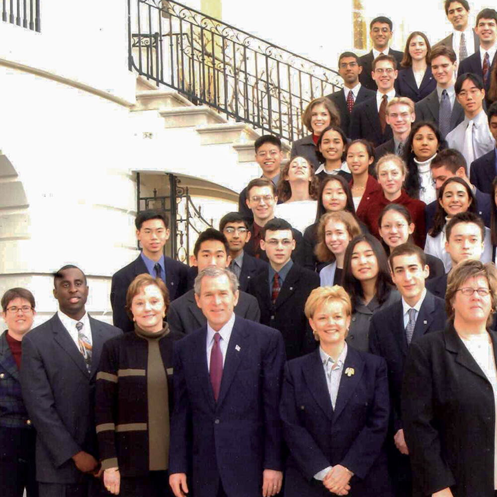 President George W. Bush poses with STS finalists at the White House