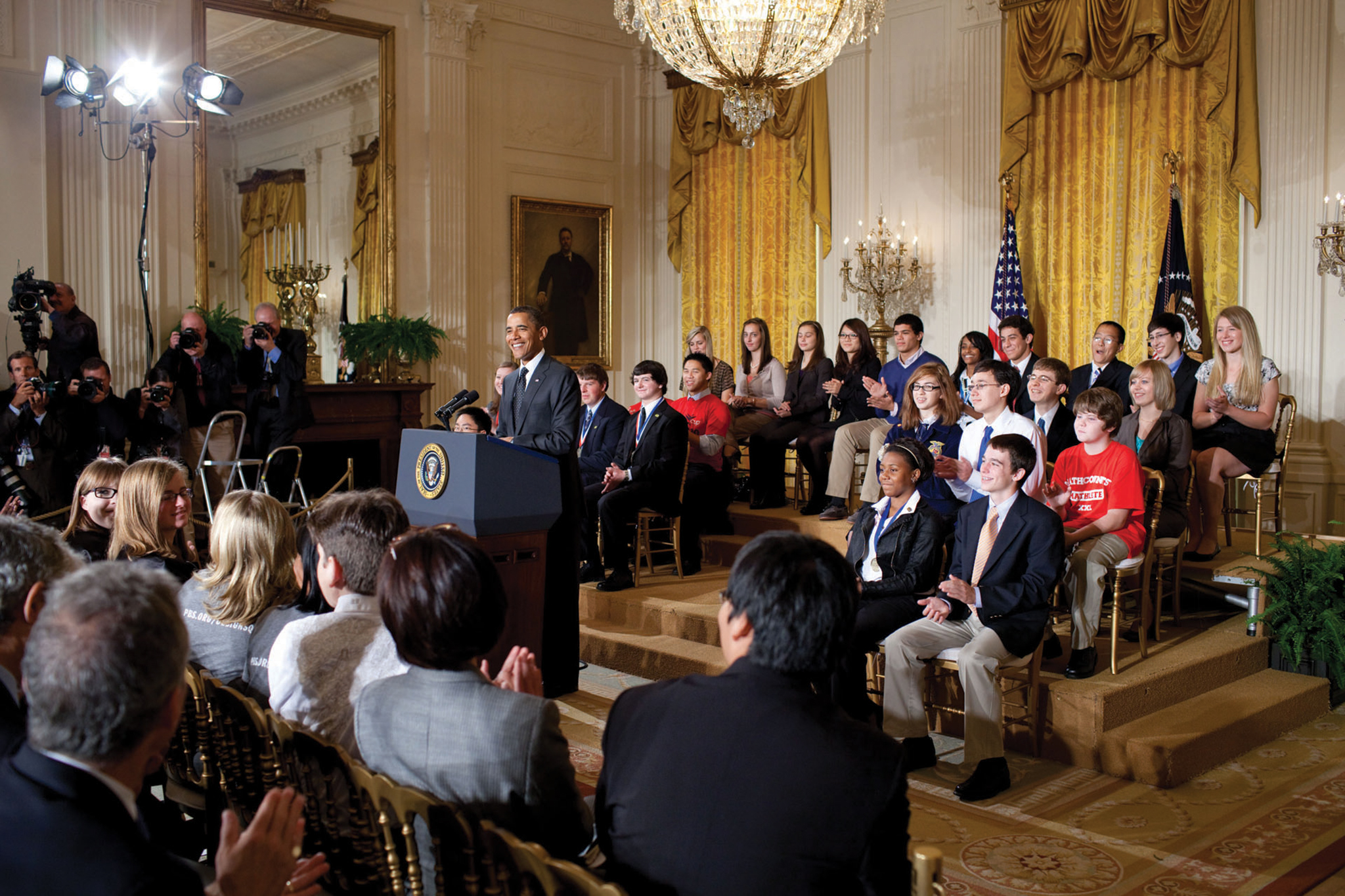 Alumni listen to President Obama’s speech at the White House Science Fair
